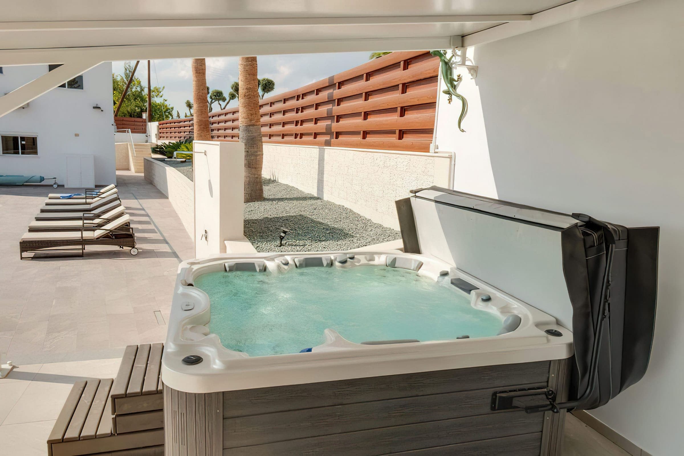 Hot tub on the terrace beside the pool