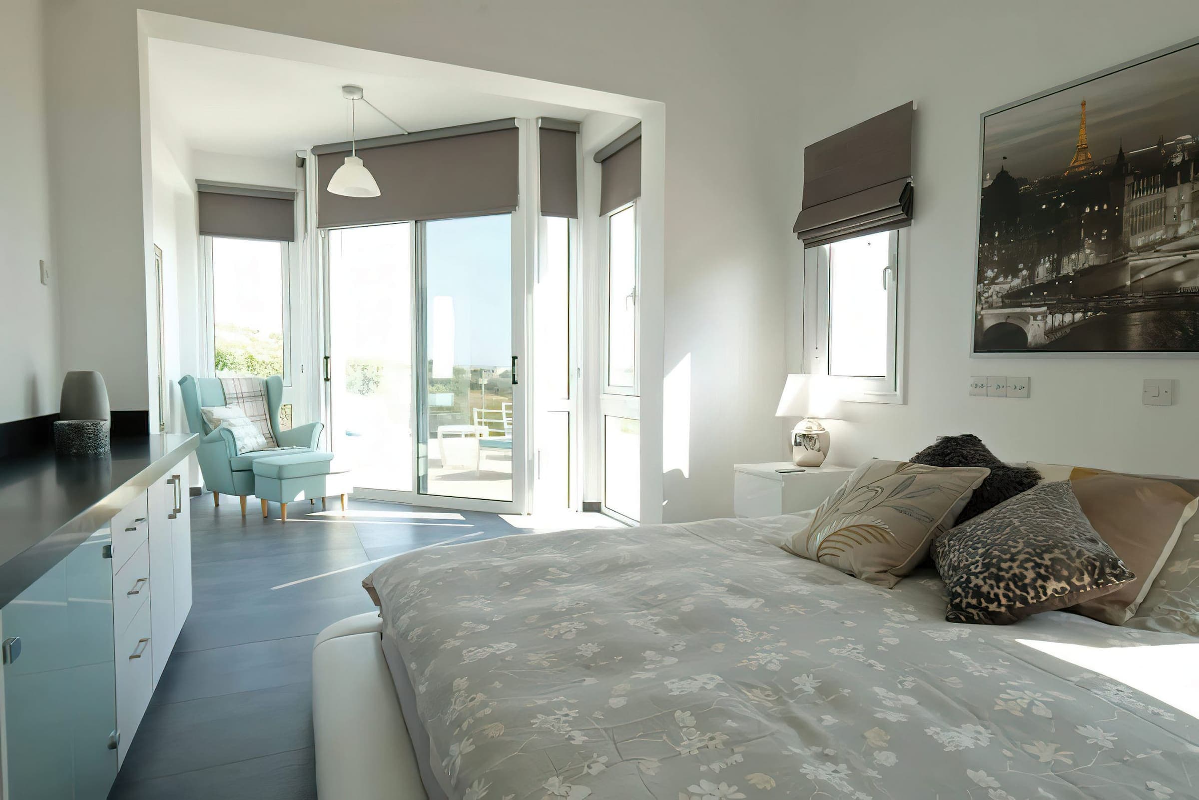 Master bedroom with glass doors to its private balcony