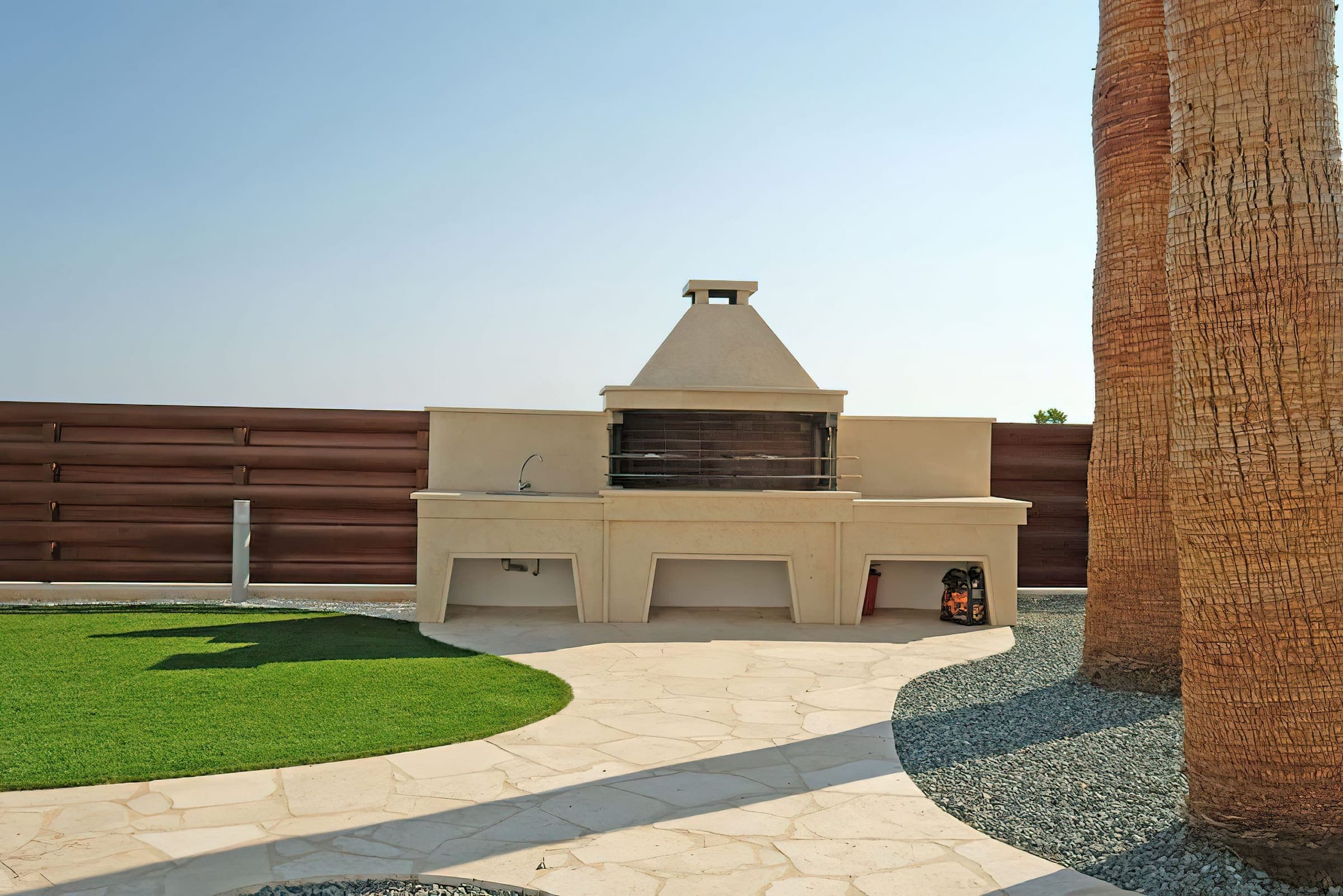 Traditional stone BBQ in the garden